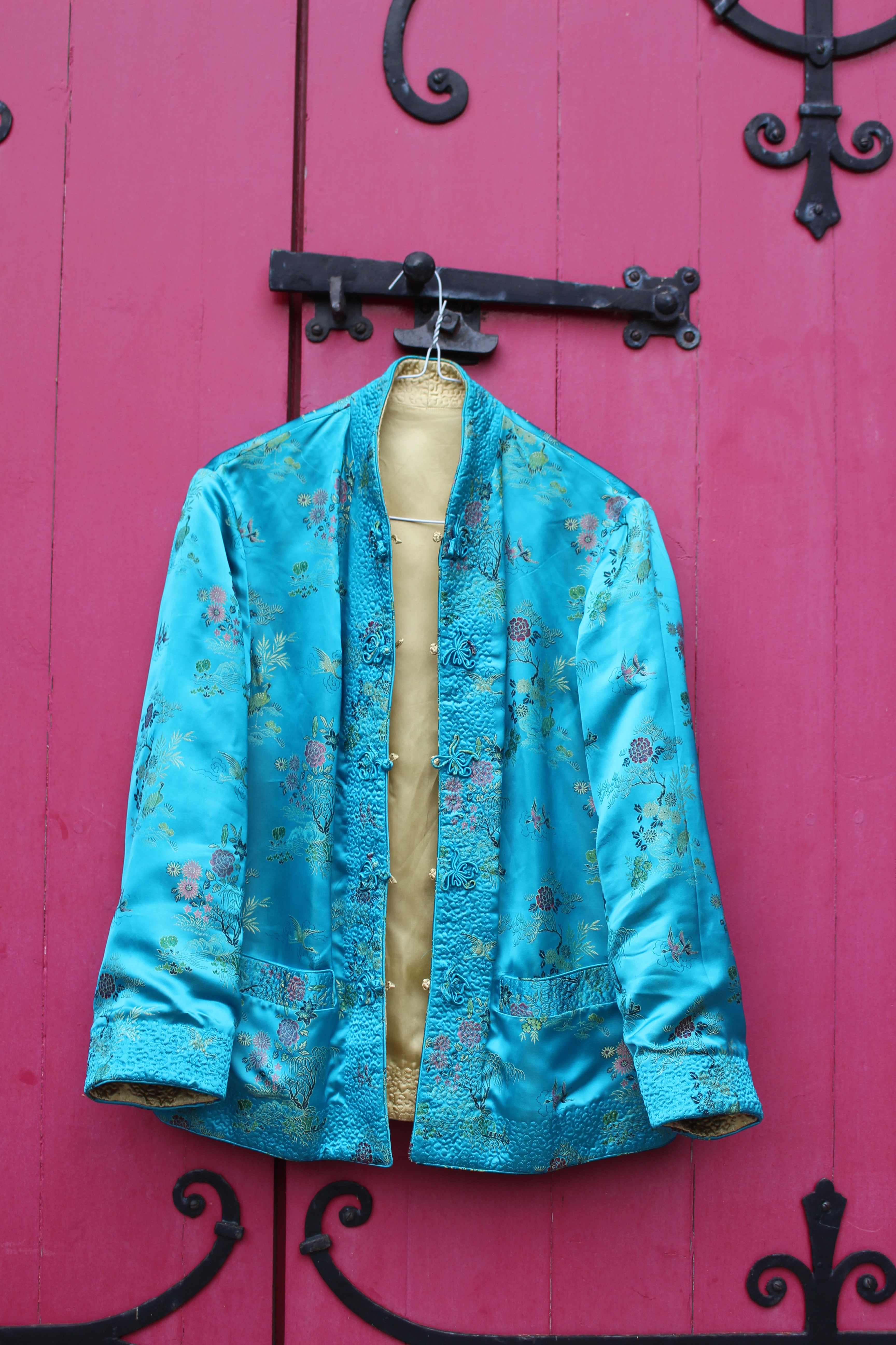 Blue and gold reversible silk Chinese jacket.