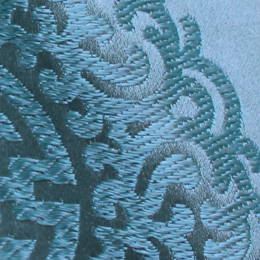 Green embroidered silk Chinese top, detail of embroidery