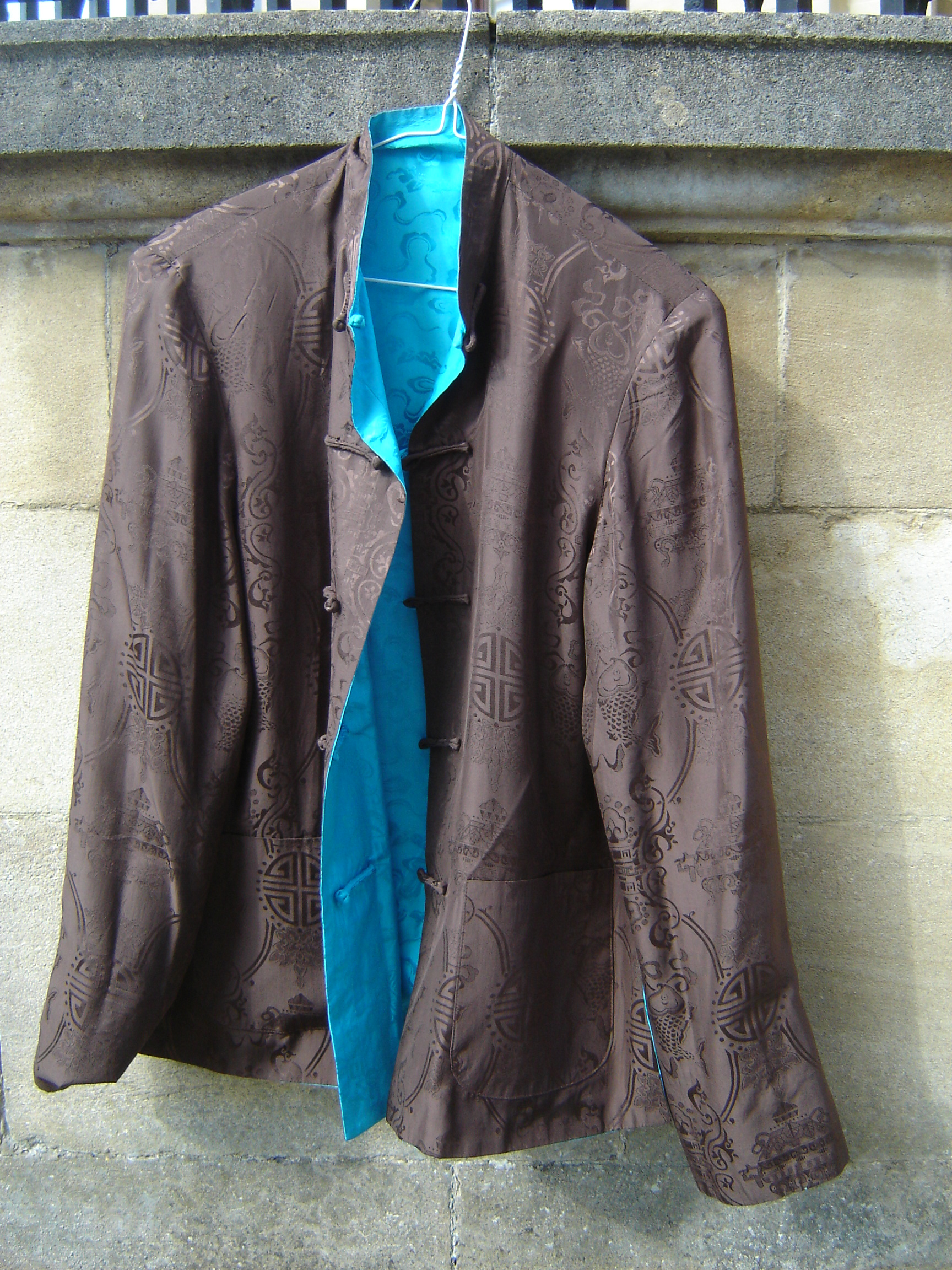Intense blue and chocolate reversible silk Chinese jacket.