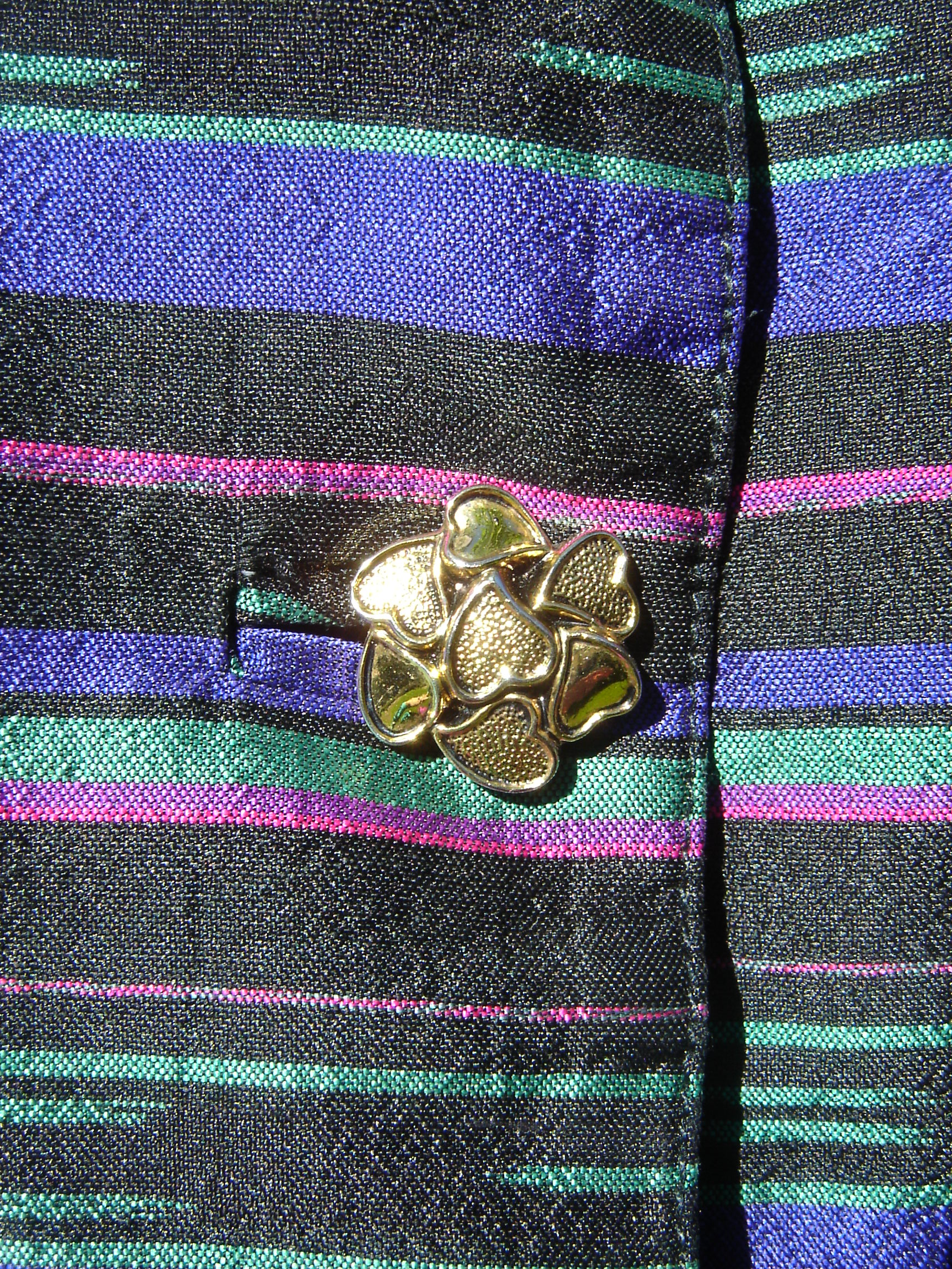 Nina Boutique striped silk top, showing button.