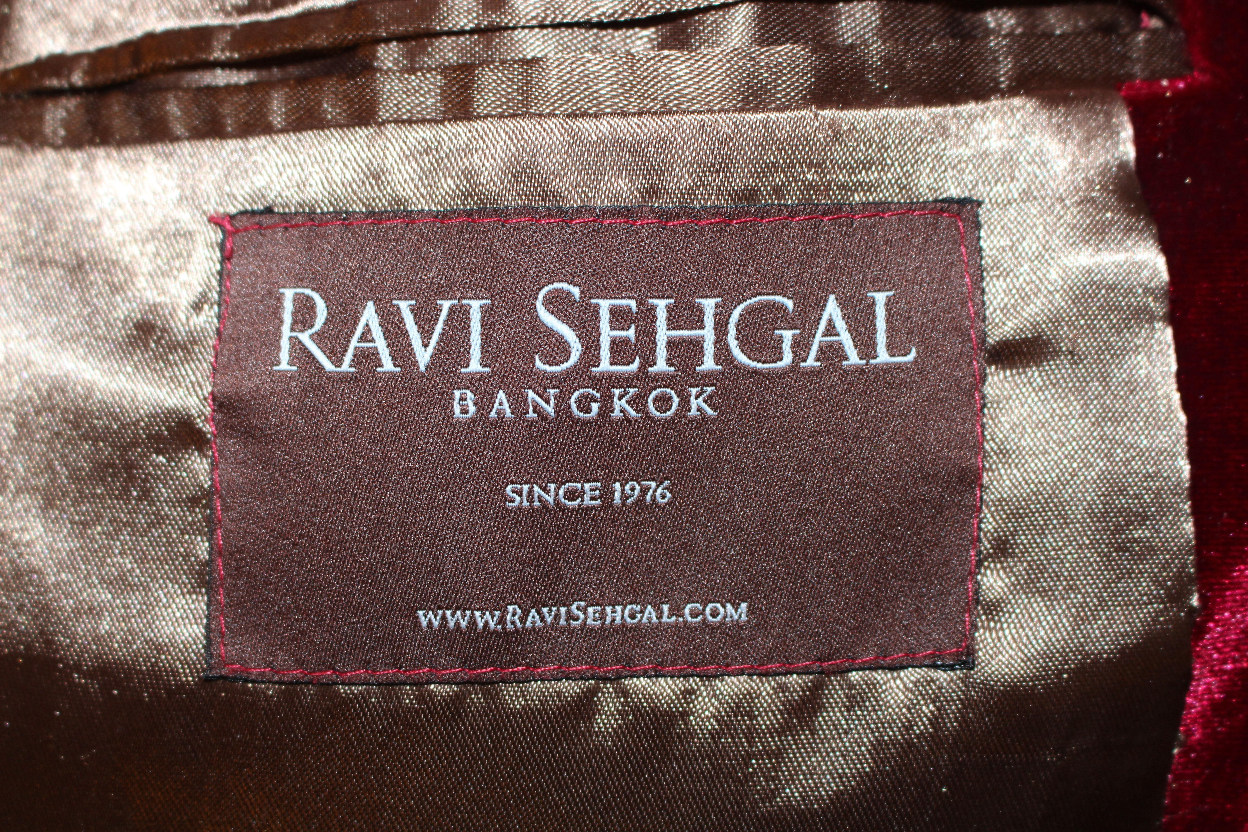 Ravi Sehgal red velvet jacket, showing label