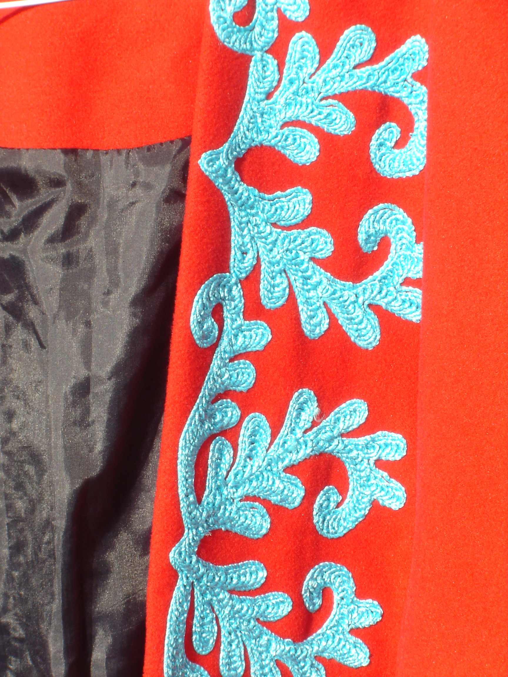 Splendid red and turquoise coat, from Unicorn, 5 Ship Street, Oxford