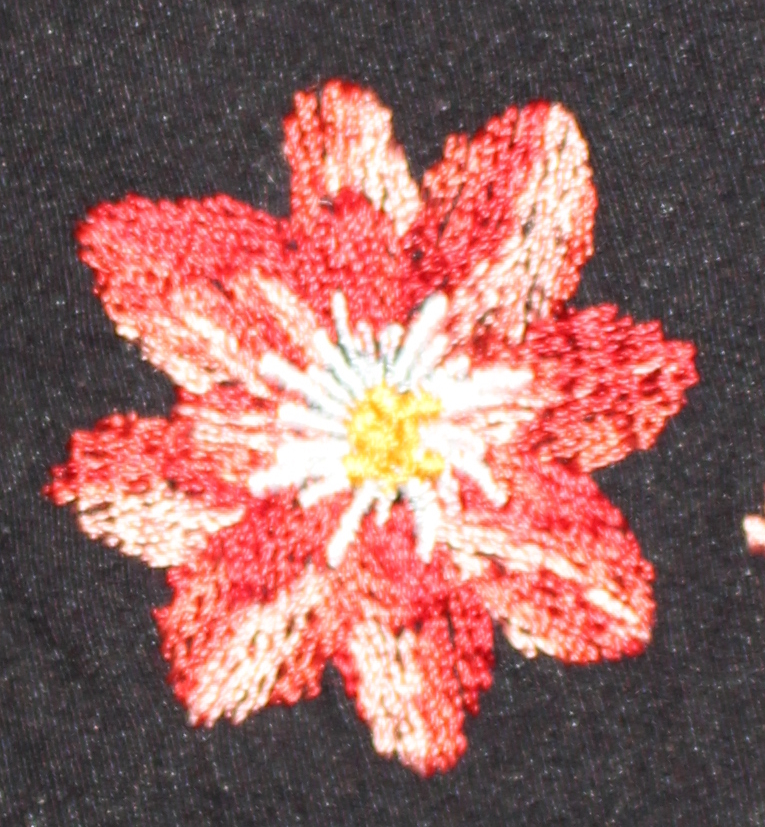 '80s flower-embroidered corset top, showing one flower