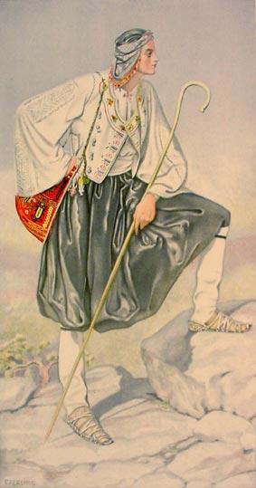 Man wearing Skyros shepherd's costume, including vraka trousers.