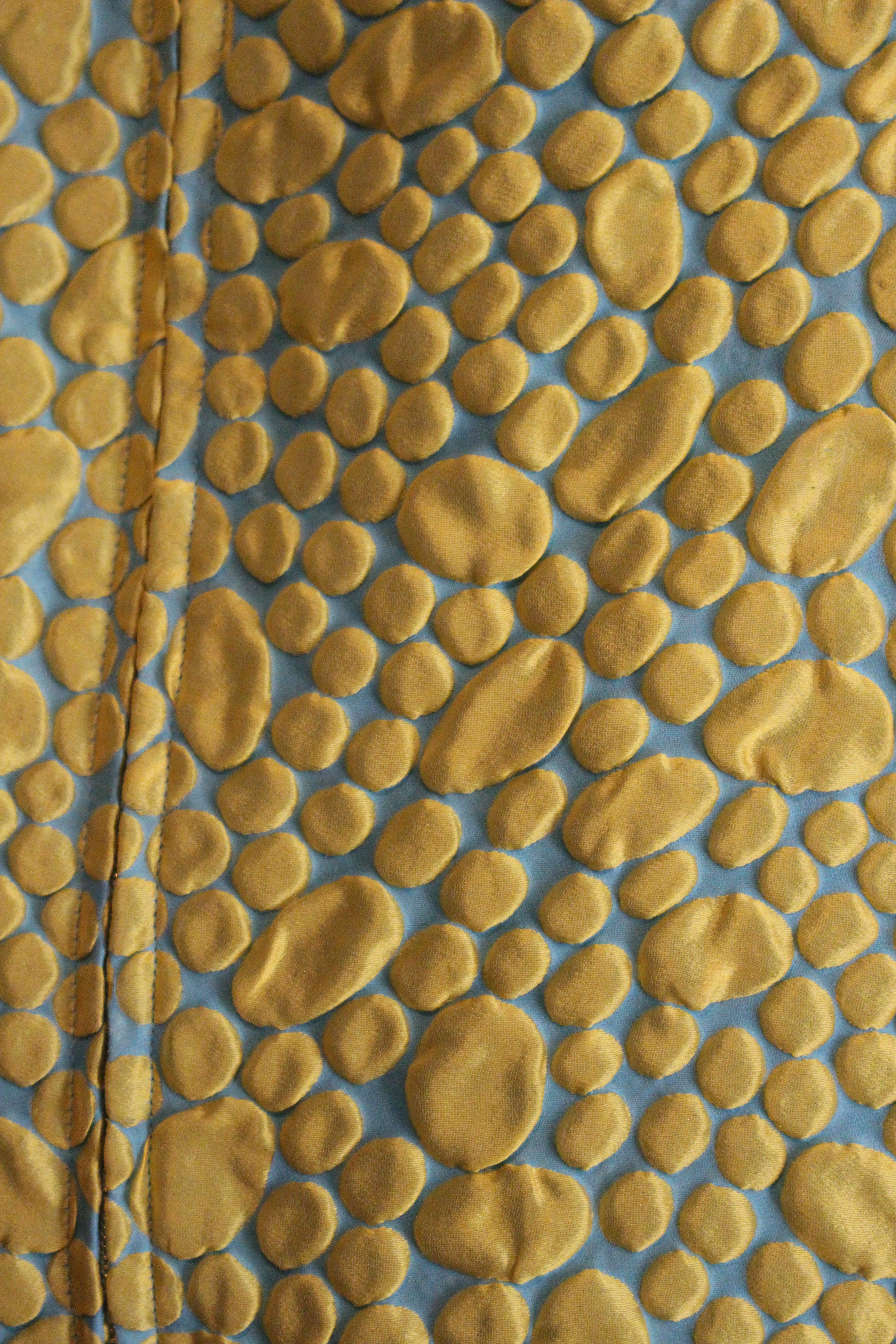 Agnes b blue cropped jacket with yellow bubbles, showing detail of 
bubbles