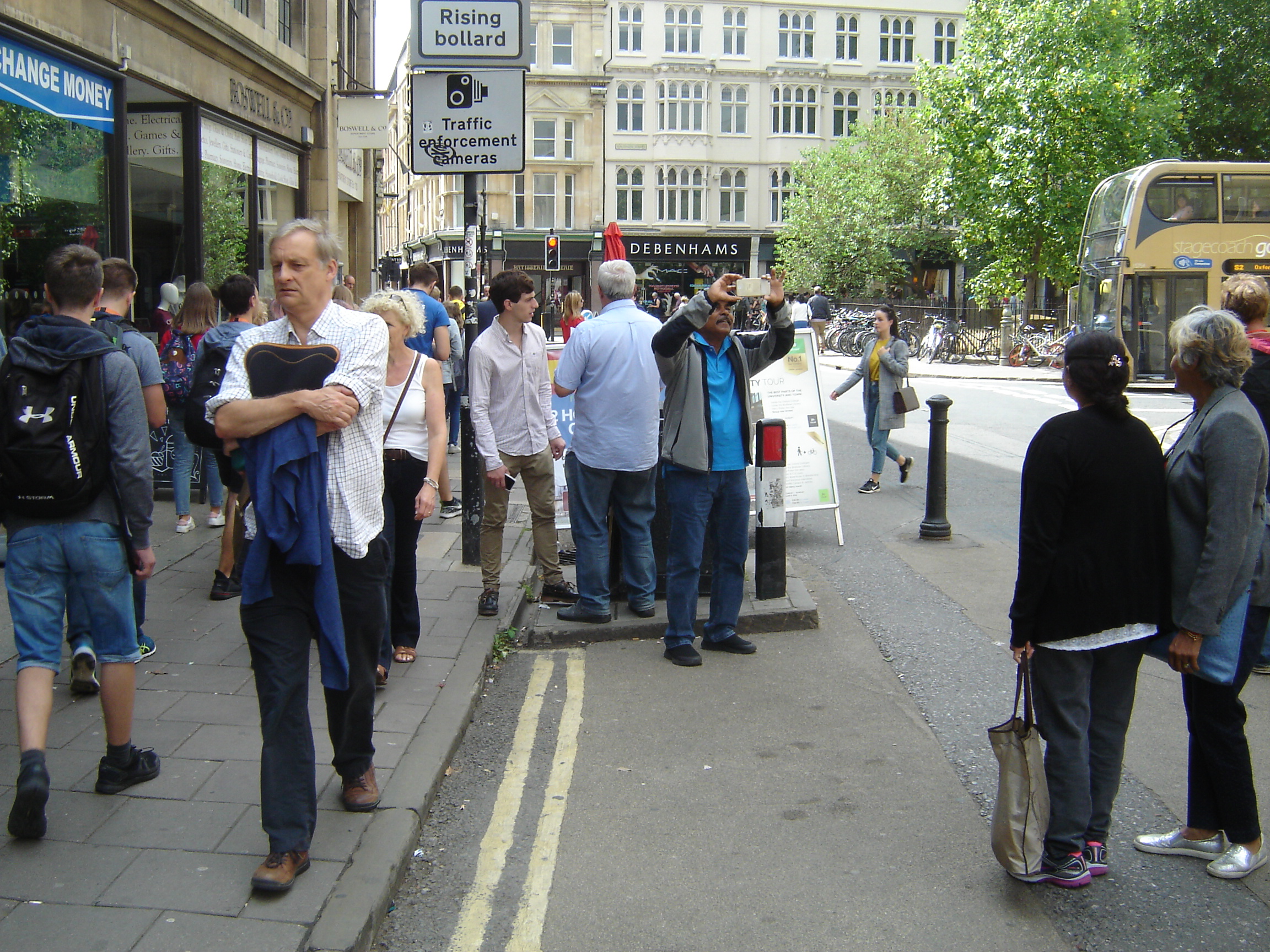 Drab people in Broad Street, oxford